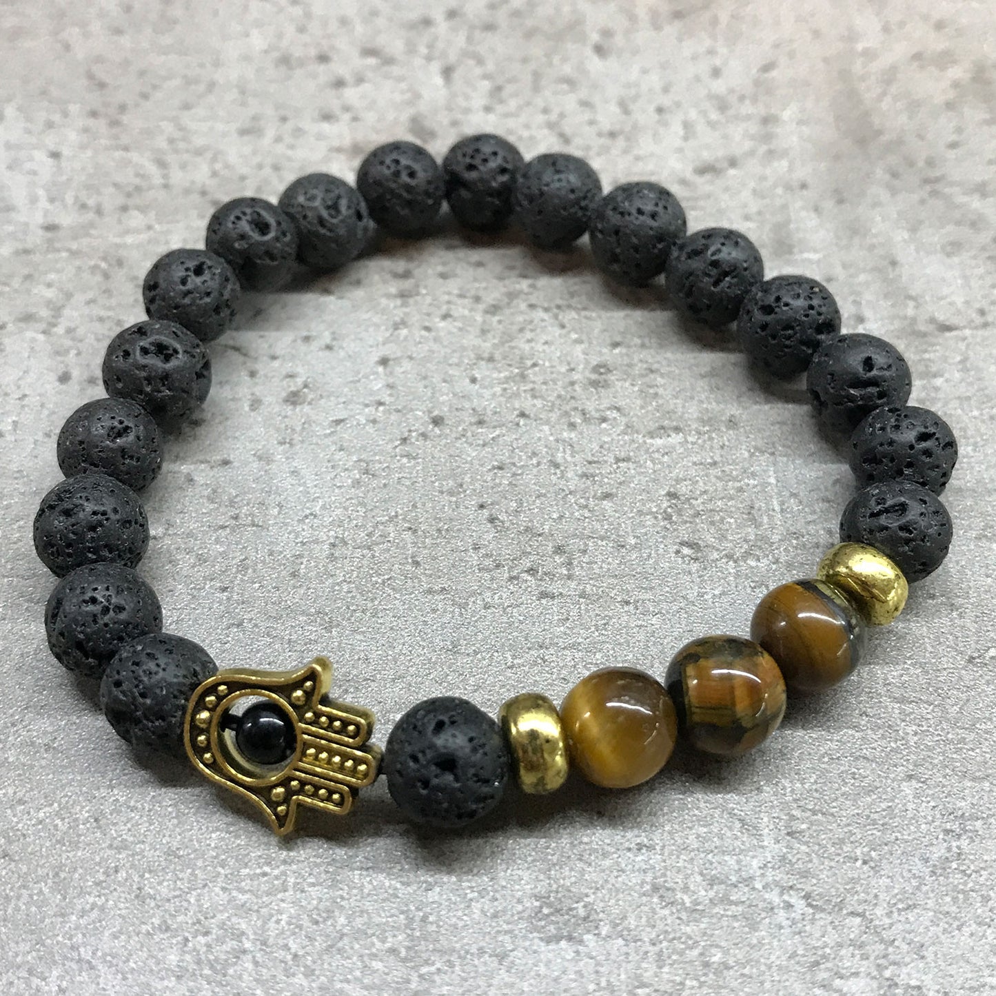 Pulsera de Piedras de Lava - Hamsa Ojo de Tigre