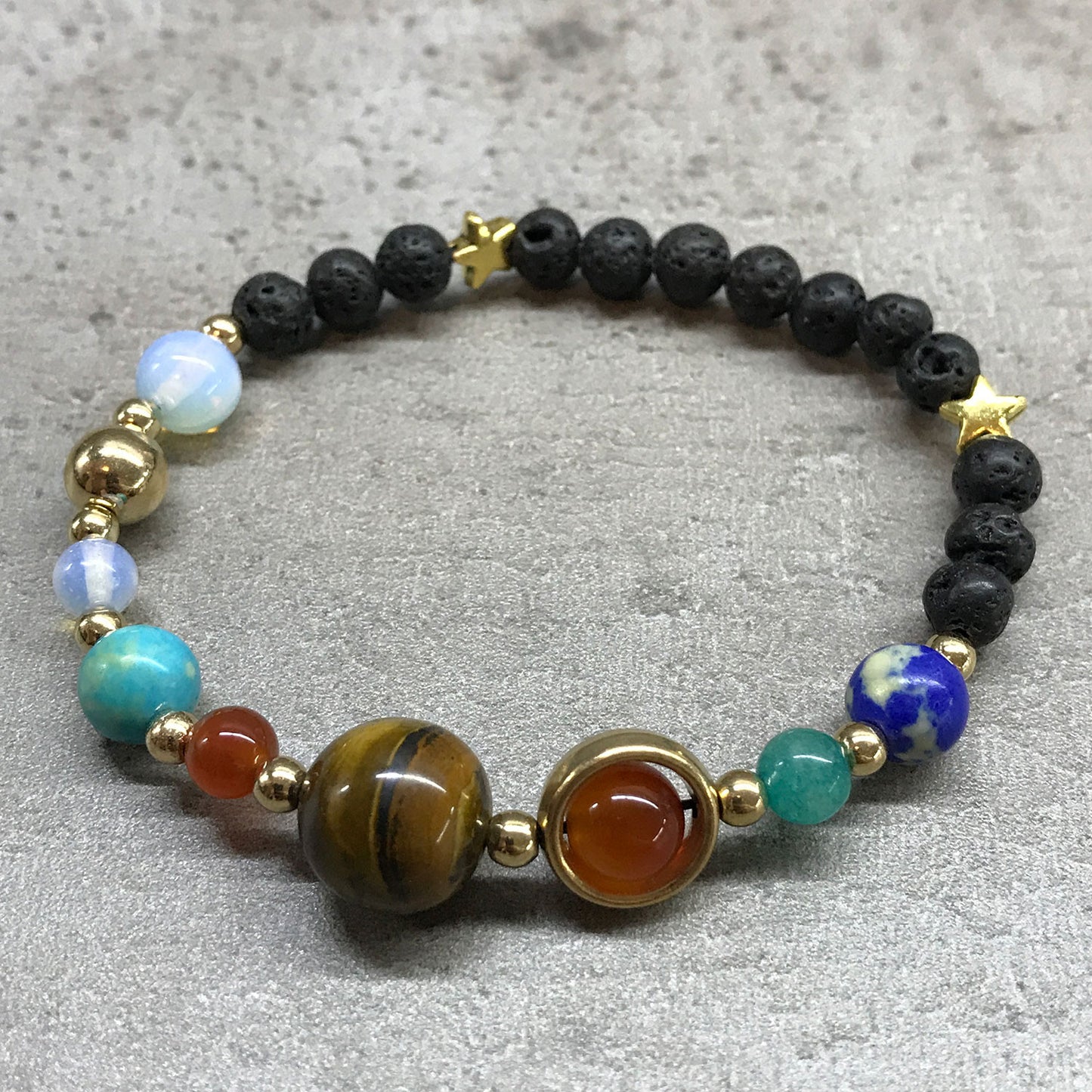 Pulsera de Piedra de Lava - Sistema Solar Dorado